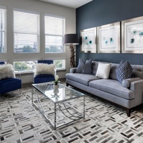 Relax and unwind in stylish living spaces a living room with a couch and a table